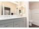 Bathroom featuring double sinks and a tub/shower combo, perfect for Gathering living at 6822 W Alta Vista Rd, Laveen, AZ 85339