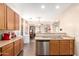 The open kitchen features modern appliances and ample countertop space at 6822 W Alta Vista Rd, Laveen, AZ 85339