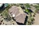 Stunning luxury estate featuring a tile roof, inviting pool, spa, manicured landscaping and patio at 7013 E Summit Trail Cir, Mesa, AZ 85207