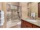 Well-appointed bathroom featuring a granite countertop and tiled shower at 7013 E Summit Trail Cir, Mesa, AZ 85207
