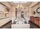 Formal dining room with wood floors, a chandelier, and an elegant table setting at 7013 E Summit Trail Cir, Mesa, AZ 85207