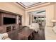 Spacious living room featuring a media center and comfortable seating at 7013 E Summit Trail Cir, Mesa, AZ 85207