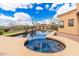 Serene water feature provides a relaxing oasis with desert views at 7013 E Summit Trail Cir, Mesa, AZ 85207