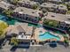 Top-down view highlighting the inviting pool area and scenic waterways at 705 W Queen Creek Rd # 1201, Chandler, AZ 85248