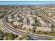 Expansive aerial view of the community showcasing well-maintained landscaping and streets at 705 W Queen Creek Rd # 1201, Chandler, AZ 85248