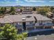 High angle view of homes surrounded by desert landscaping and mature trees with a mountain range visible at 705 W Queen Creek Rd # 1201, Chandler, AZ 85248