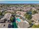 Picturesque aerial shot of the neighborhood with a pool and peaceful water features at 705 W Queen Creek Rd # 1201, Chandler, AZ 85248