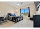 Bedroom with a ceiling fan, desk, and lots of natural light at 705 W Queen Creek Rd # 1201, Chandler, AZ 85248