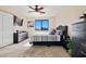 Relaxing bedroom with modern furniture, a large window, and calming neutral color scheme at 705 W Queen Creek Rd # 1201, Chandler, AZ 85248