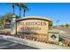 A community sign that reads 'The Bridges at Ocotillo' located at '705 W. Queen Creek Road' at 705 W Queen Creek Rd # 1201, Chandler, AZ 85248