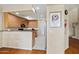 Bright kitchen featuring wood cabinets, recessed lighting, and a breakfast bar for casual dining at 705 W Queen Creek Rd # 1201, Chandler, AZ 85248