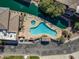 Eye-level aerial view showcasing a unique swimming pool and an in-ground spa at 705 W Queen Creek Rd # 1201, Chandler, AZ 85248
