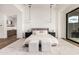 Main bedroom with a neutral color palette, pendant lights and hardwood floors at 7498 E Whisper Rock Trl, Scottsdale, AZ 85266