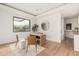 Home office with hardwood floors, modern furnishings, and natural light at 7498 E Whisper Rock Trl, Scottsdale, AZ 85266
