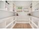 Spacious walk-in pantry with open shelves and ample storage space for organization at 7498 E Whisper Rock Trl, Scottsdale, AZ 85266