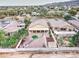 Aerial perspective of a home showcasing the backyard layout and neighborhood in the distance at 7822 S 15Th Way, Phoenix, AZ 85042
