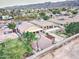 Gravel backyard featuring a covered patio, firepit, garden, and block fence, creating an inviting outdoor space at 7822 S 15Th Way, Phoenix, AZ 85042