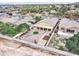 A charming home with a covered patio, gravel yard, firepit, garden, and block fence for private outdoor living at 7822 S 15Th Way, Phoenix, AZ 85042