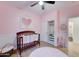 A charming Bedroom with a decorative closet and wood-look floors at 7822 S 15Th Way, Phoenix, AZ 85042