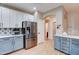 Well-lit kitchen featuring stainless steel refrigerator and white countertops at 7822 S 15Th Way, Phoenix, AZ 85042