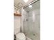Modern bathroom features white marble tile, glass enclosed shower with rain shower head, and convenient shelf at 7930 E Arlington Rd # 8, Scottsdale, AZ 85250