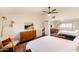 Cozy bedroom featuring stylish decor, wooden furnishings, and modern light fixture at 7930 E Arlington Rd # 8, Scottsdale, AZ 85250