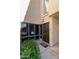 Welcoming entryway with a stylish front door, sidelight windows and attractive landscaping at 7930 E Arlington Rd # 8, Scottsdale, AZ 85250