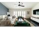 Cozy living room featuring a plush sofa, accent chairs, and abundant natural light at 7930 E Arlington Rd # 8, Scottsdale, AZ 85250