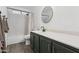 Traditional bathroom featuring a white subway tile shower, toilet and vanity with a vessel sink at 7931 W Shaw Butte Dr, Peoria, AZ 85345