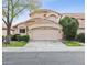 Charming two-story home featuring a two-car garage, well-maintained landscaping, and a classic tile roof at 7931 W Shaw Butte Dr, Peoria, AZ 85345
