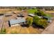 Expansive property featuring horse facilities, covered parking, green pastures, and a comfortable home at 836 W Lenora Way, San Tan Valley, AZ 85140