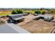 Aerial view of horse property, outbuildings, and paddocks, perfect for equestrian activities and country living at 836 W Lenora Way, San Tan Valley, AZ 85140