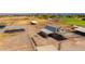 This property features well-maintained equestrian facilities, including barns, shelters, and ample outdoor space at 836 W Lenora Way, San Tan Valley, AZ 85140
