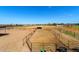Wide angle view of horse property with multiple enclosed pens, covered shelter and panoramic views at 836 W Lenora Way, San Tan Valley, AZ 85140