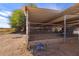 Horse stall featuring strong metal fencing, ample shading, and easy access to utilities at 836 W Lenora Way, San Tan Valley, AZ 85140