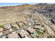 Community aerial view showcasing luxury homes nestled near a mountain range at 8504 S 30Th St, Phoenix, AZ 85042