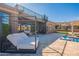Relaxing backyard with lounging area, pool, spa, and outdoor seating, perfect for entertaining at 8504 S 30Th St, Phoenix, AZ 85042