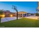 Spacious backyard with basketball court, pool, and gazebo for outdoor entertainment at 8504 S 30Th St, Phoenix, AZ 85042