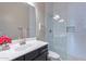 Bathroom with a sink and vanity, white subway tile shower with glass enclosure at 8504 S 30Th St, Phoenix, AZ 85042