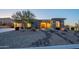 Charming single-story home with desert landscaping, stone accents, and warm inviting entryway at 8504 S 30Th St, Phoenix, AZ 85042