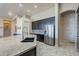 Bright kitchen featuring granite countertops, stainless steel appliances, and custom tile flooring at 8504 S 30Th St, Phoenix, AZ 85042