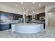 Bright kitchen with granite countertops, stainless steel appliances, mosaic backsplash and pendant lighting at 8504 S 30Th St, Phoenix, AZ 85042
