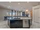 Beautiful kitchen with black cabinets, granite countertops, and stainless steel appliances at 8504 S 30Th St, Phoenix, AZ 85042