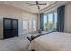 Spacious main bedroom suite with a tray ceiling, bay windows, and outside view at 8504 S 30Th St, Phoenix, AZ 85042