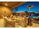 Inviting outdoor patio with cozy seating area, spiral staircase, and clear view of the backyard at 8504 S 30Th St, Phoenix, AZ 85042