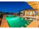Stunning outdoor pool area with built-in bar seating and spiral staircase access to an upper deck at 8504 S 30Th St, Phoenix, AZ 85042