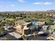 Aerial view of community pool and recreation center with lush landscaping at 9738 E Tiburon Ave, Mesa, AZ 85212