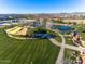 Beautiful community park with lakes, pathways, mature trees, picnic pavilion and mountain views in a desert landscape at 9738 E Tiburon Ave, Mesa, AZ 85212
