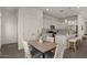 View of kitchen and dining area with seating for four at 9738 E Tiburon Ave, Mesa, AZ 85212