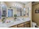 Bathroom with double sink vanity and ample lighting at 1035 W 2Nd St, Mesa, AZ 85201